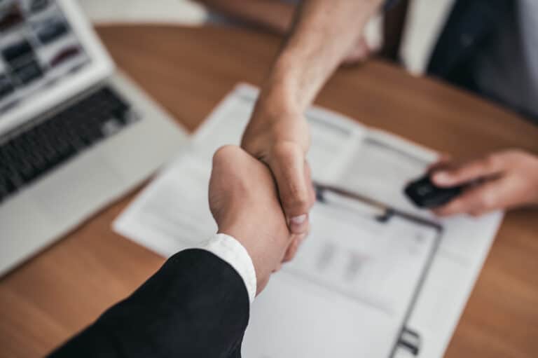 two people shaking hands