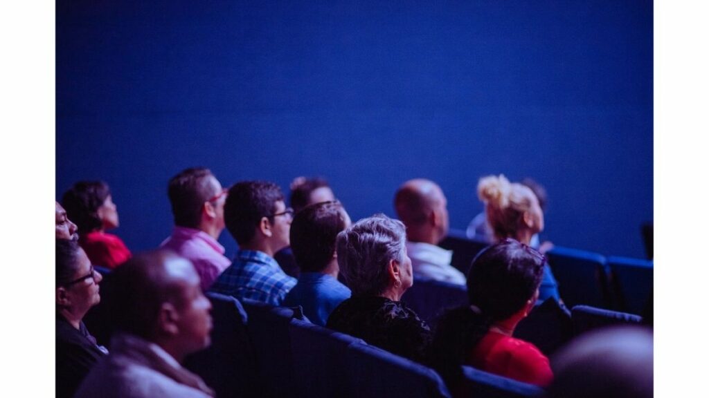 people sitting in a theater