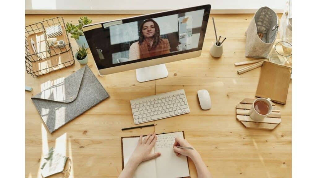 person watching a video on their computer