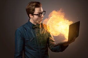 Nerdy Guy with an exploding laptop