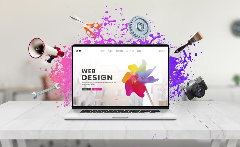 laptop with website redesign on the screen